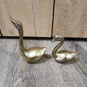 brass swan figurines